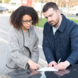 image of two people discussing insurance